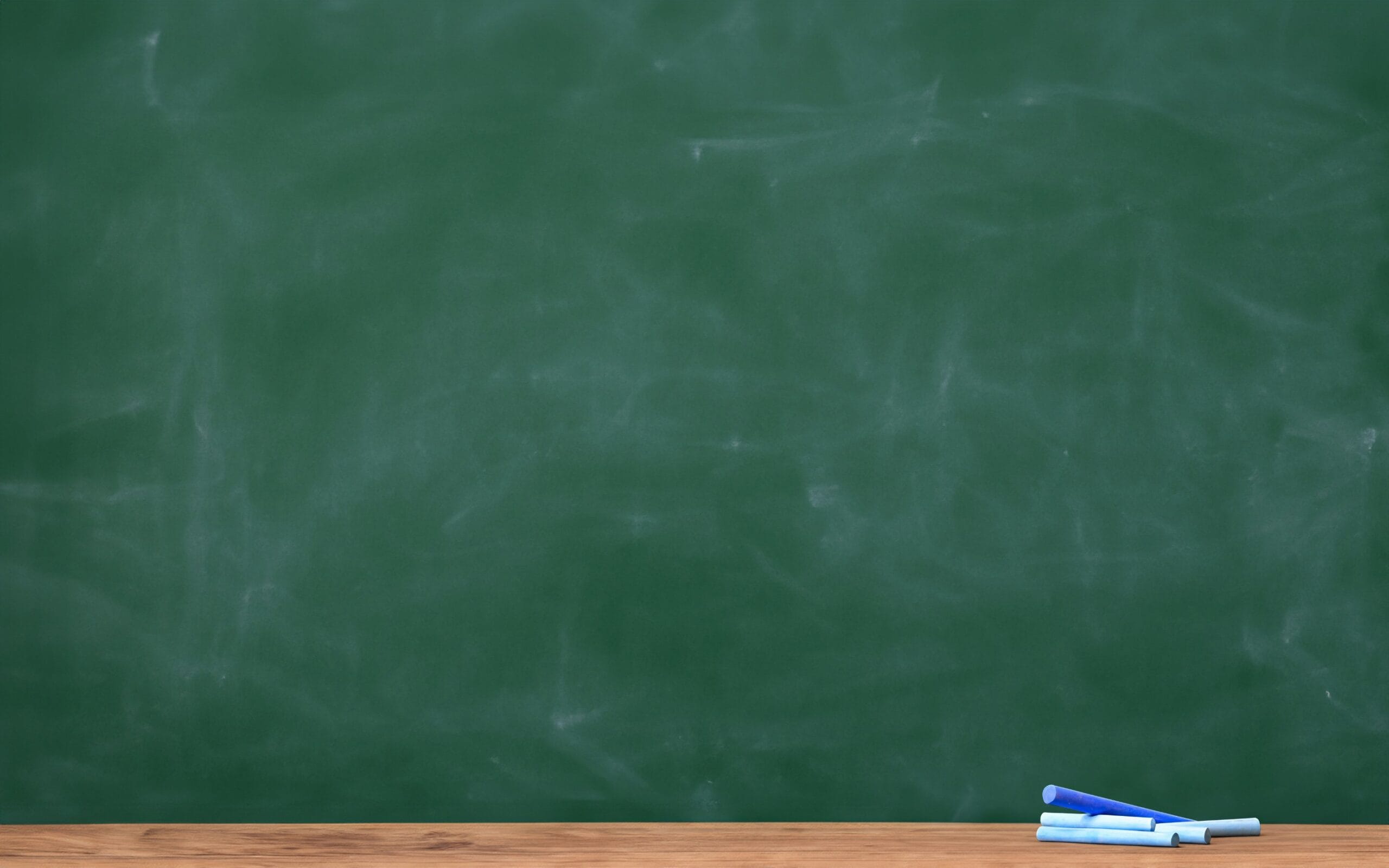 A chalkboard with chalk.